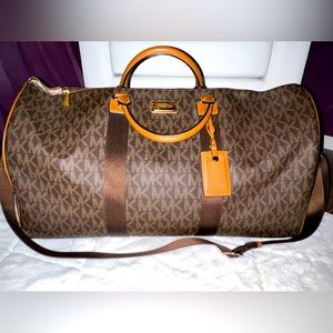 Brown Michael Kors duffel bag